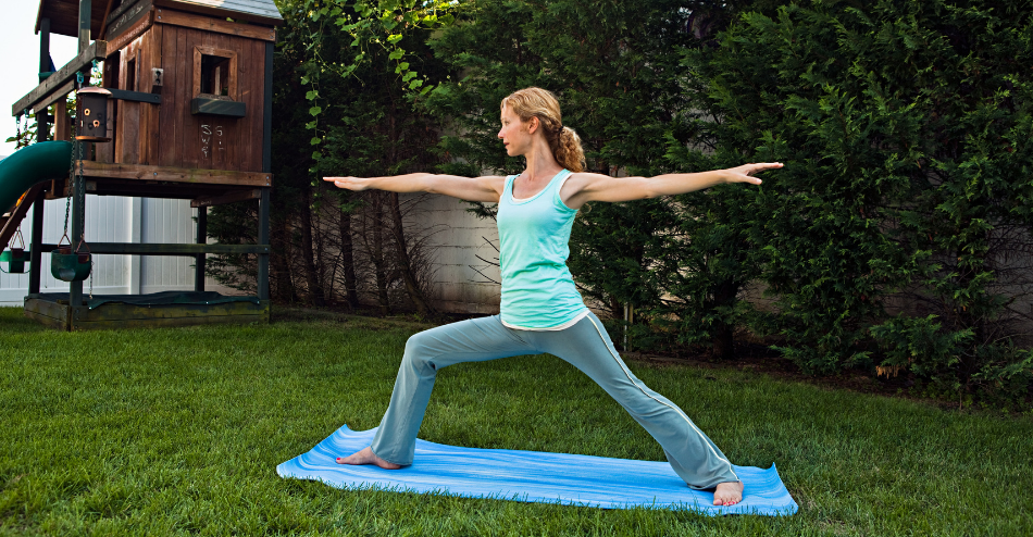 woman doing yoga in garden